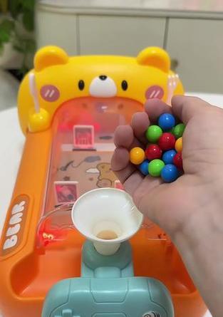 溜珠子游戏机的玩法是什么？操作起来难吗？  第1张